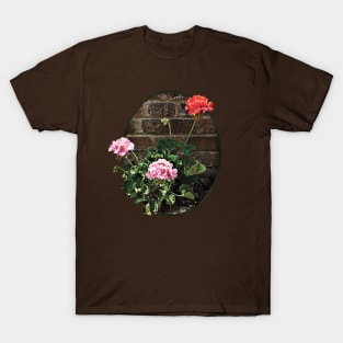 Pink and Red Geraniums Against Brick T-Shirt